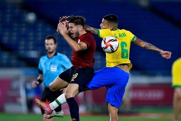 Oscar Gil of Spain and Guilherme Arana of Brazil during the Tokyo 2020 Olympic Mens Football Tournament Gold Medal Match between Brazil and Spain at...