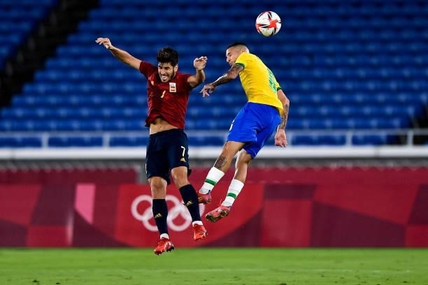 Marco Asensio of Spain and Guilherme Arana of Brazil during the Tokyo 2020 Olympic Mens Football Tournament Gold Medal Match between Brazil and Spain...