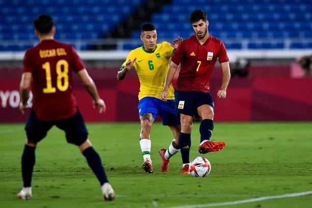 Guilherme Arana of Brazil and Marco Asensio of Spain during the Tokyo 2020 Olympic Mens Football Tournament Gold Medal Match between Brazil and Spain...