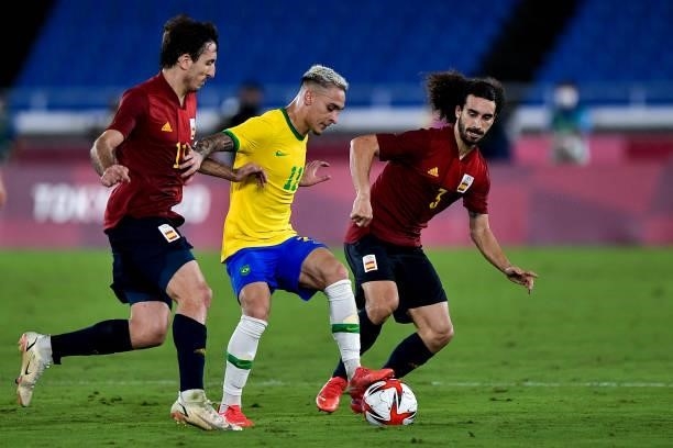 Mikel Oyarzabal of Spain, Antony of Brazil and Cucurella of Spain during the Tokyo 2020 Olympic Mens Football Tournament Gold Medal Match between...