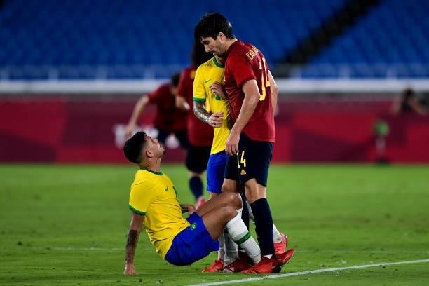 Bruno Guimaraes of Brazil and Carlos Soler of Spain during the Tokyo 2020 Olympic Mens Football Tournament Gold Medal Match between Brazil and Spain...