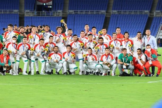 Team Mexico poses with their bronze medals during the medal ceremony at International Stadium Yokohama on August 07, 2021 in Yokohama, Kanagawa,...