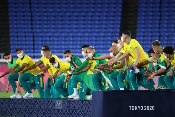 Team Brazil celebrates during the medal ceremony after defeating Team Spain 2-1 to win the men's gold medal match between Team Brazil and Team Spain...