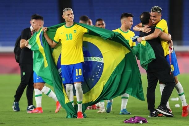 Richarlison of Team Brazil celebrates their side's victory after the Men's Gold Medal Match between Brazil and Spain on day fifteen of the Tokyo 2020...
