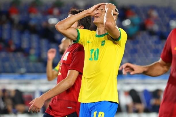 Richarlison of Team Brazil reacts after a missed shot attempt in the first half during the men's gold medal match between Team Brazil and Team Spain...