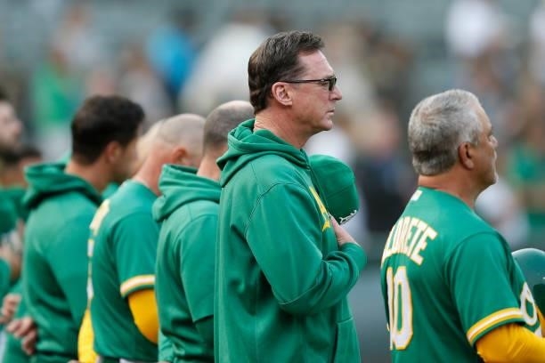 Manager Bob Melvin of the Oakland Athletics stands for the national anthem before the game against the Texas Rangers at RingCentral Coliseum on...
