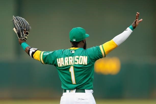 Josh Harrison of the Oakland Athletics warms up before the game against the Texas Rangers at RingCentral Coliseum on August 06, 2021 in Oakland,...