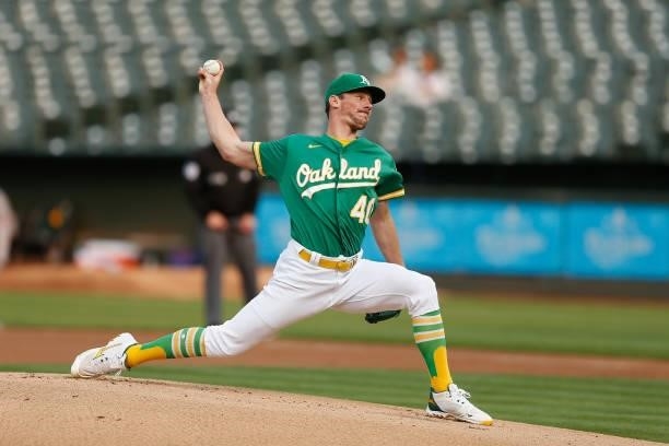 Chris Bassitt of the Oakland Athletics pitches in the top of the first inning against the Texas Rangers at RingCentral Coliseum on August 06, 2021 in...