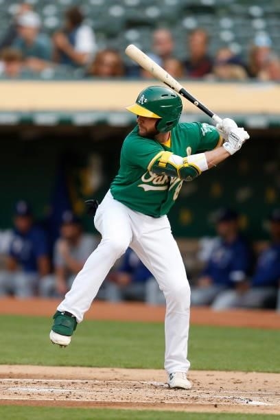 Jed Lowrie of the Oakland Athletics at bat against the Texas Rangers at RingCentral Coliseum on August 06, 2021 in Oakland, California.