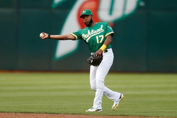 Elvis Andrus of the Oakland Athletics fields the ball against the Texas Rangers at RingCentral Coliseum on August 06, 2021 in Oakland, California.