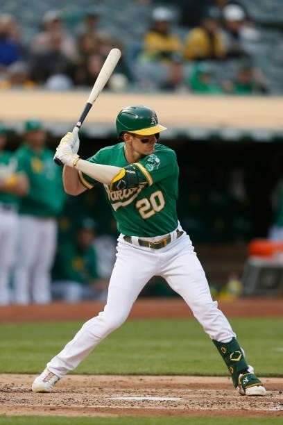 Mark Canha of the Oakland Athletics at bat against the Texas Rangers at RingCentral Coliseum on August 06, 2021 in Oakland, California.