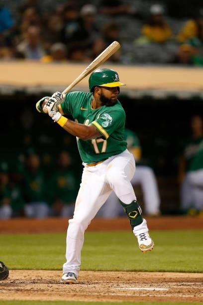 Elvis Andrus of the Oakland Athletics at bat against the Texas Rangers at RingCentral Coliseum on August 06, 2021 in Oakland, California.