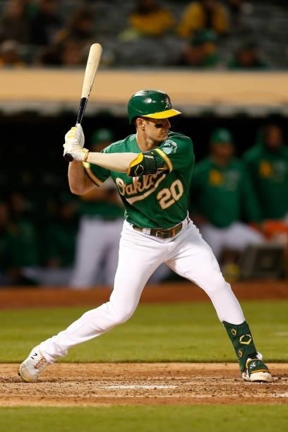 Mark Canha of the Oakland Athletics at bat against the Texas Rangers at RingCentral Coliseum on August 06, 2021 in Oakland, California.