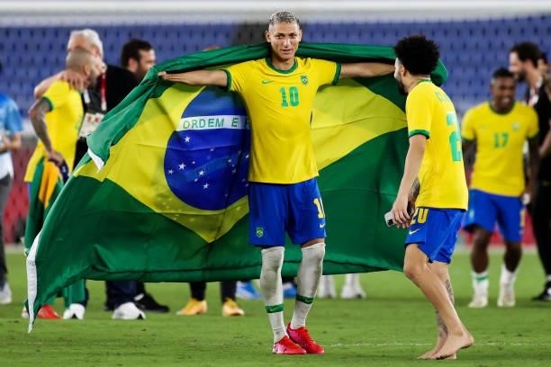 Richarlison of Team Brazil celebrates the victory after the Men's Gold Medal Match between Team Brazil and Team Spain on day fifteen of the Tokyo...