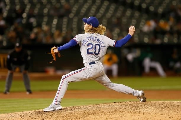 Mike Foltynewicz of the Texas Rangers pitches against the Oakland Athletics at RingCentral Coliseum on August 06, 2021 in Oakland, California.