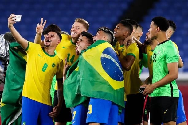 Players of Team Brazil celebrate the victory after the Men's Gold Medal Match between Team Brazil and Team Spain on day fifteen of the Tokyo 2020...
