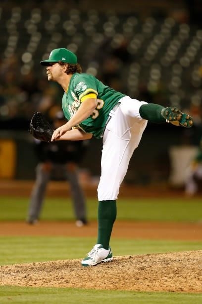 Andrew Chafin of the Oakland Athletics pitches against the Texas Rangers at RingCentral Coliseum on August 06, 2021 in Oakland, California.