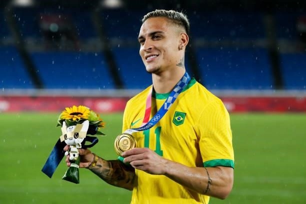 Matheus Henrique of Brazil celebrates after the award ceremony of the Men's Gold Medal Match between Brazil and Spain on day fifteen of the Tokyo...