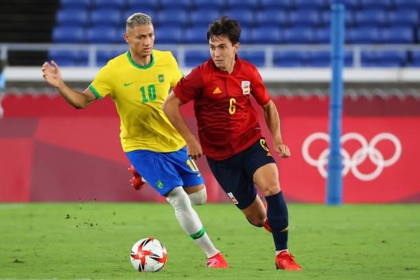 Martin Zubimendi of Team Spain controls the ball against Richarlison of Team Brazil in the second half during the men's gold medal match between Team...
