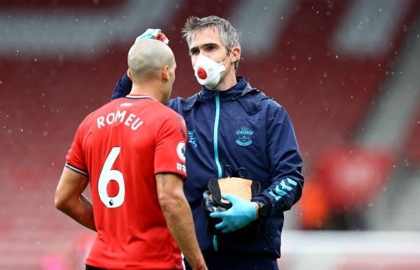 Oriol Romeu of Southampton receives treatment from Club Doctor Inigo Sarriegui during the pre season friendly match between Southampton FC and...