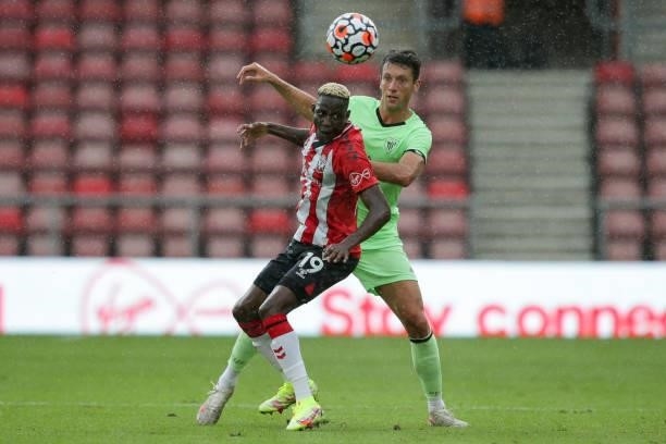 Moussa Djenepo of Southampton is closed down by Mikel Vesga of Athletic Bilbao during a pre-season friendly between Southampton FC and Athletic...