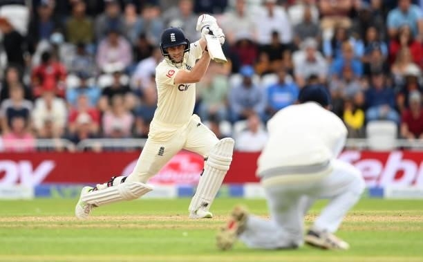 Joe Root of England drives during the fourth day of the 1st LV= Test match between England and India at Trent Bridge on August 07, 2021 in...