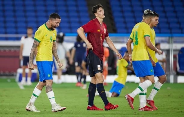 Douglas Luiz of Team Brazil celebrates their side's victory after the Men's Gold Medal Match between Team Brazil and Team Spain on day fifteen of the...