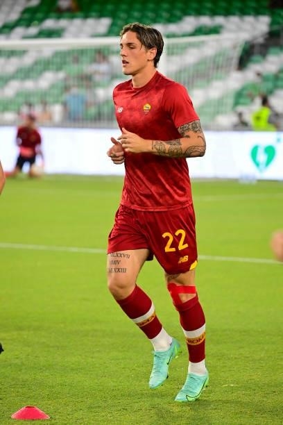 Nicolò Zaniolo of AS Roma warms up before the Unbeatables Cup at Estadio Benito Villamarin on August 07, 2021 in Seville, Spain.