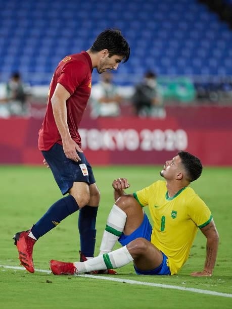 Bruno Guimaraes of Team Brazil argues with Carlos Soler of Team Spain during the Men's Gold Medal Match between Team Brazil and Team Spain on day...