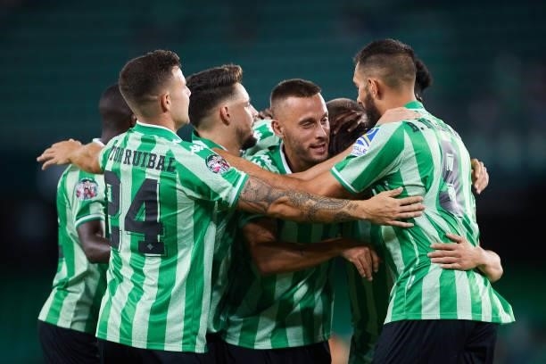 Rodri Sanchez of Real Betis celebrates scoring a goal with team mates during a friendly match between Real Betis and AS Roma at Estadio Benito...