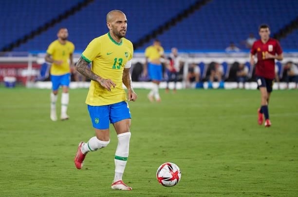 Daniel Alves of Team Brazil runs with the ball during the Men's Gold Medal Match between Team Brazil and Team Spain on day fifteen of the Tokyo 2020...