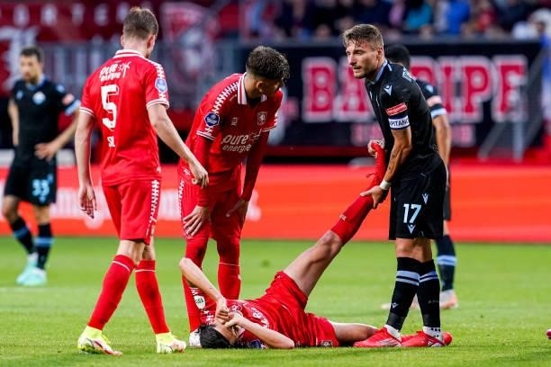 Ramiz Zerrouki of FC Twente injured, Ciro Immobile of SS Lazio during the Preseason Friendly Match match between FC Twente and SS Lazio at De Grolsch...