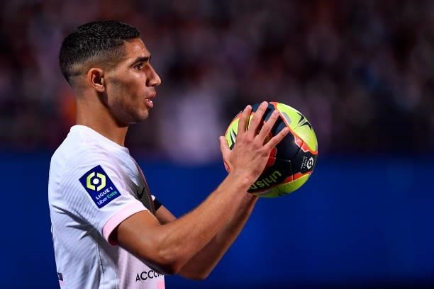 Achraf Hakimi of Paris Saint-Germain looks on during the Ligue 1 football match between Troyes and Paris at Stade de l'Aube on August 07, 2021 in...