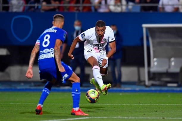 Kylian Mbappe of Paris Saint-Germain kicks the ball during the Ligue 1 football match between Troyes and Paris at Stade de l'Aube on August 07, 2021...