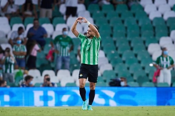 Alex Moreno of Real Betis celebrates scoring a goal during a friendly match between Real Betis and AS Roma at Estadio Benito Villamarin on August 07,...