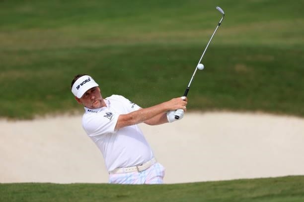 Ian Poulter of England plays a shot on the 16th hole during the third round of the World Golf Championship-FedEx St Jude Invitational at TPC...