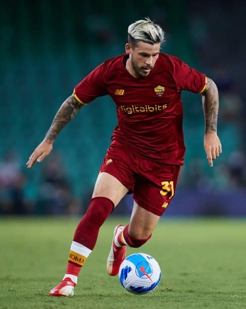 Carles Perez of AS Roma in action during a friendly match between Real Betis and AS Roma at Estadio Benito Villamarin on August 07, 2021 in Seville,...