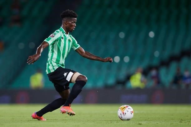 Paul Akouokou of Real Betis in action during a friendly match between Real Betis and AS Roma at Estadio Benito Villamarin on August 07, 2021 in...