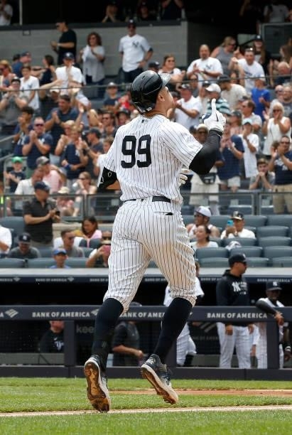 Aaron Judge of the New York Yankees celebrates his first inning home run against the Seattle Mariners at Yankee Stadium on August 07, 2021 in New...