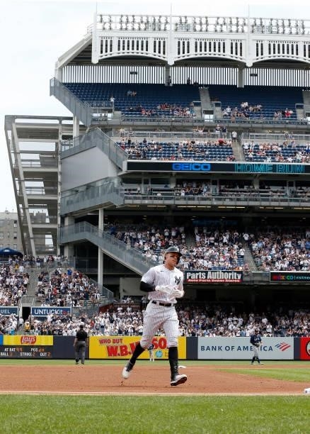 Aaron Judge of the New York Yankees runs the bases after his first inning home run against the Seattle Mariners at Yankee Stadium on August 07, 2021...