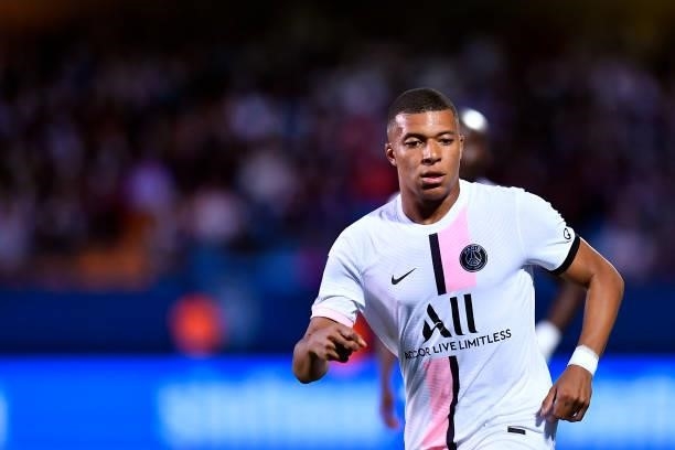 Kylian Mbappe of Paris Saint-Germain looks on during the Ligue 1 football match between Troyes and Paris at Stade de l'Aube on August 07, 2021 in...