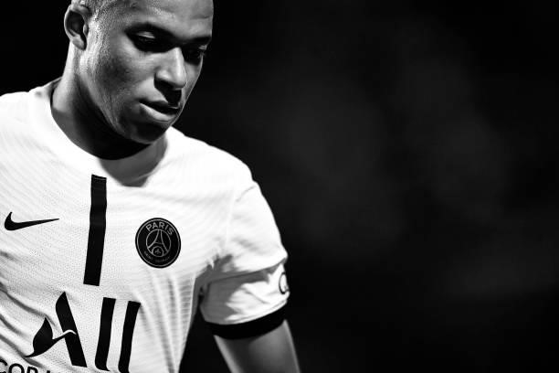 Kylian Mbappe of Paris Saint-Germain looks on during the Ligue 1 football match between Troyes and Paris at Stade de l'Aube on August 07, 2021 in...