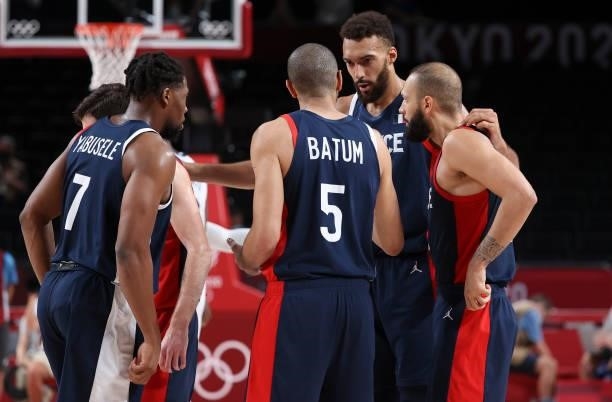 Rudy Gobert of France talks to Guerschon Yabusele, Nicolas Batum, Evan Fournier during the Men's Basketball Gold Medal Final between United States...