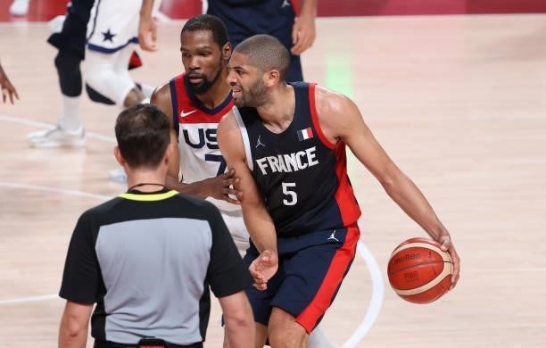 Nicolas Batum of France, Kevin Durant of USA during the Men's Basketball Gold Medal Final between United States and France on day fifteen of the...