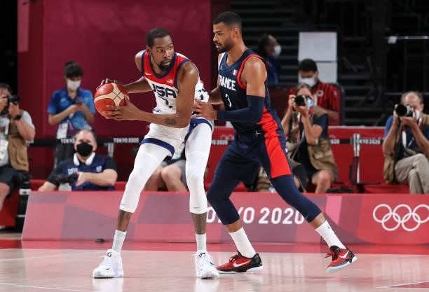 Kevin Durant of USA, Timothe Luwawu-Cabarrot of France during the Men's Basketball Gold Medal Final between United States and France on day fifteen...