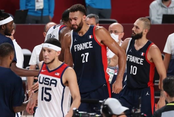 Rudy Gobert of France crying, consoled by Evan Fournier of France following the defeat in the Men's Basketball Gold Medal Final between United States...