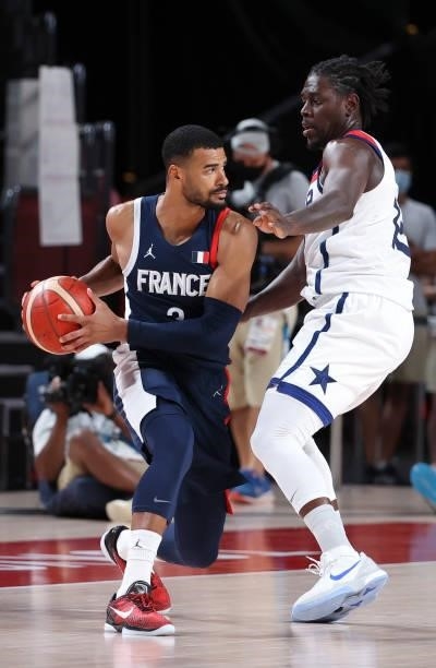 Timothe Luwawu-Cabarrot of France, Jrue Holiday of USA during the Men's Basketball Gold Medal Final between United States and France on day fifteen...