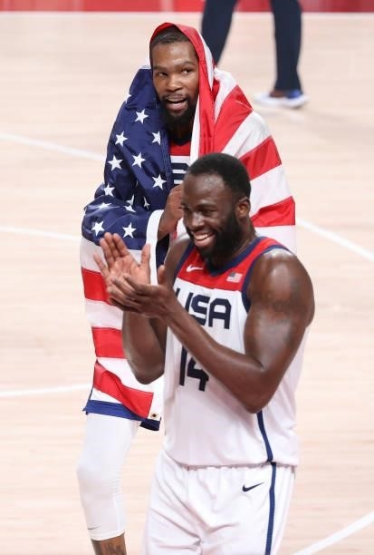 Kevin Durant, Draymond Green of USA celebrate the victory following the Men's Basketball Gold Medal Final between United States and France on day...