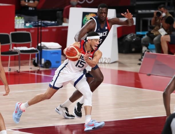 Devin Booker of USA, Moustapha Fall of France during the Men's Basketball Gold Medal Final between United States and France on day fifteen of the...