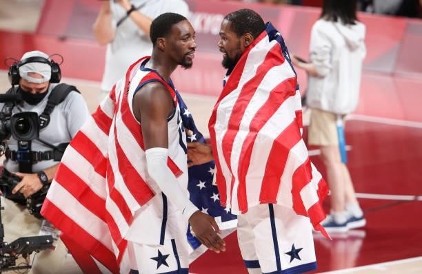Bam Adebayo, Kevin Durant of USA celebrate the victory following the Men's Basketball Gold Medal Final between United States and France on day...